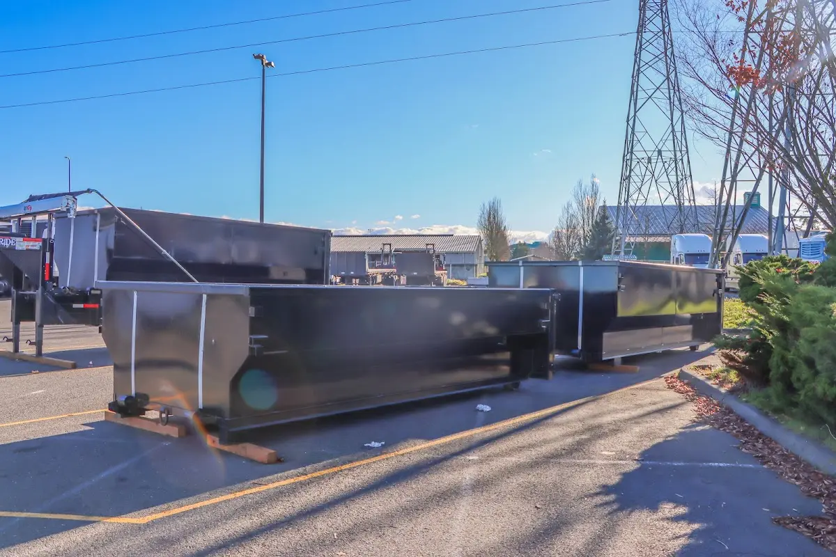 Roll-off dumpster ready for waste disposal at job site for 12 Yard Dumpster Rental in Glocester